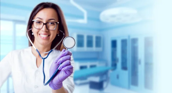 Young female doctor with middle eastern appearance in operating room.