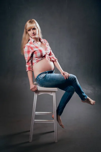 Studio Picture Beautiful Pregnant Blonde Woman Checkered Shirt Blue Jeans — Stock Photo, Image