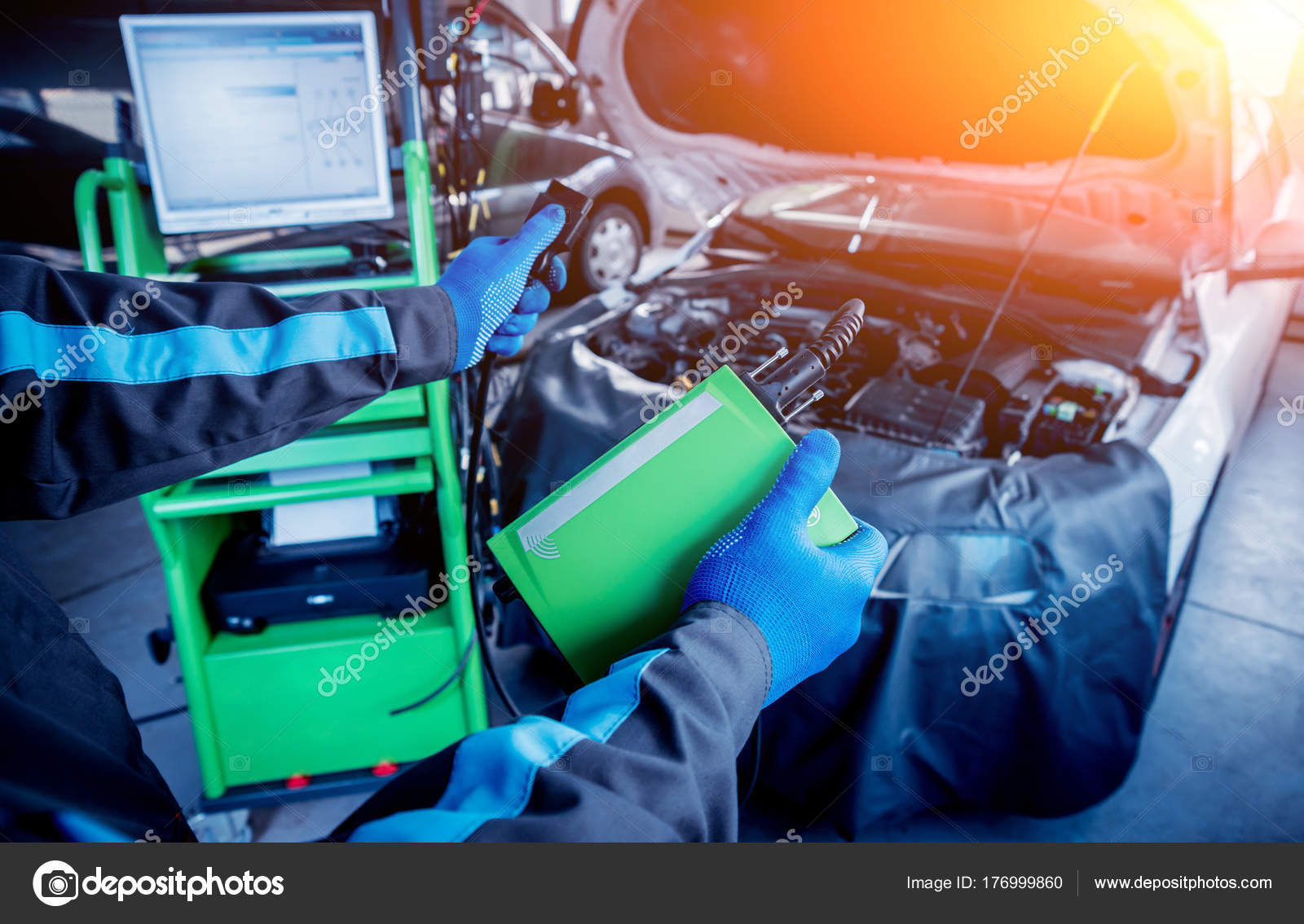 Professional Car Mechanic Working Auto Repair Service Stock Photo by