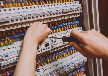 Repairing the switchboard voltage with automatic switches. clipart