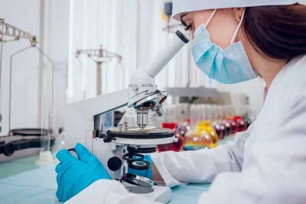 Science technician at work in the laboratory. Medical background