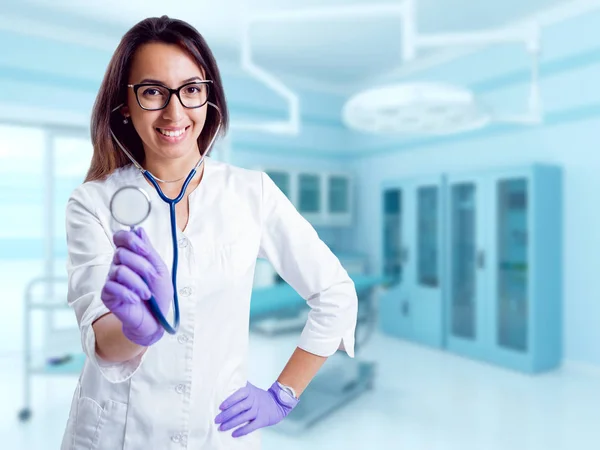 Young female doctor with middle eastern appearance in operating room.