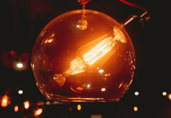 Loft pendant lamps with Edison light bulbs.
