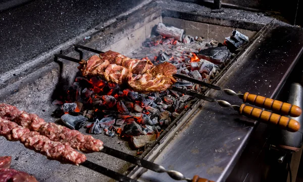 Delicious beef and pork barbecue on grill. Georgian restaurant. — Stock Photo, Image