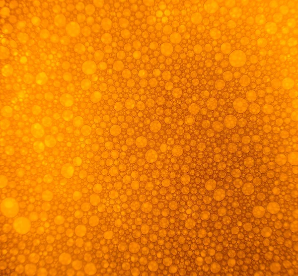 Farbige Seifen- und Wasserblasen. Abstrakter Hintergrund. — Stockfoto