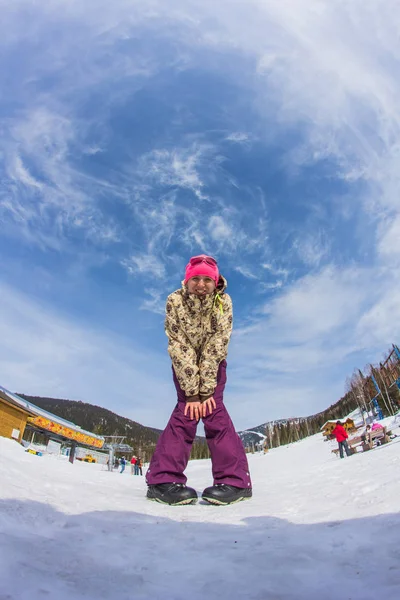 Lächelnde Snowboarderin — Stockfoto
