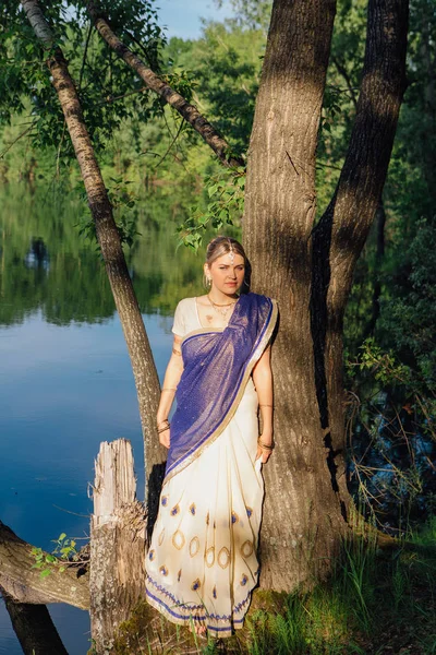 Beautiful european woman in sari