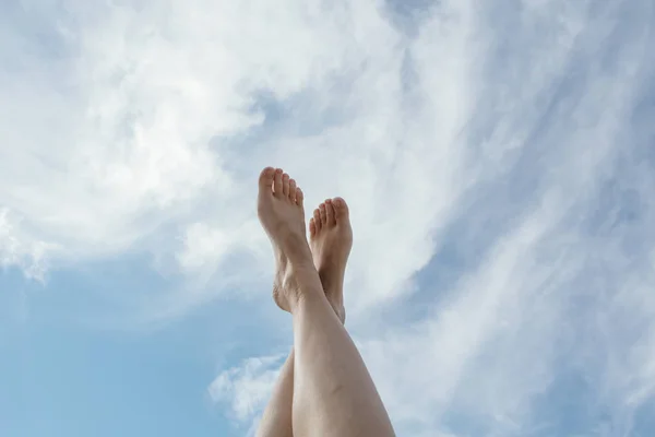 Feet up infront of the sky