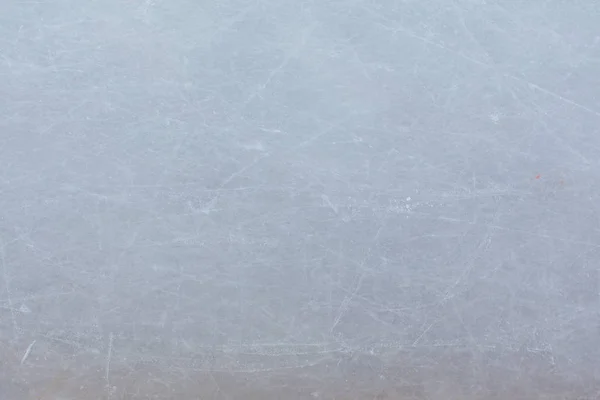 Ice hockey rink scratches surface abstract background.