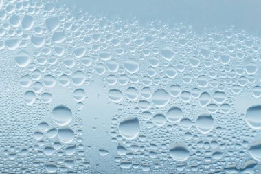 Condensation abstract water drops on the window glass