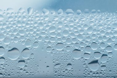 Condensation abstract water drops on the window glass