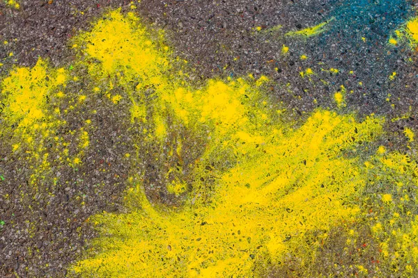 Achtergrond van kleurrijke Holi poeder op de grond — Stockfoto
