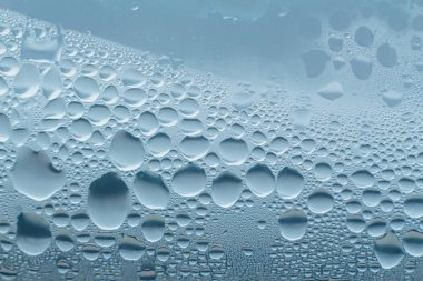 Condensation abstract water drops on the window glass
