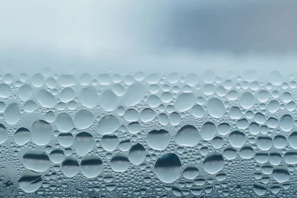 Kondensacja abstrakcyjne krople wody na szybie okna — Zdjęcie stockowe