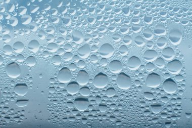 Condensation abstract water drops on the window glass