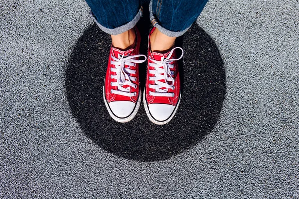 Red Sneakers Shoes Woman Feet Asphalt Black Circle Sneakers Shoes — Stock Photo, Image
