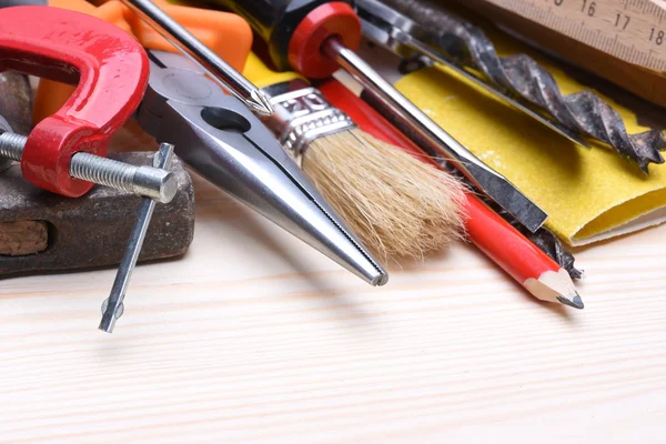 Set of working tools on board — Stock Photo, Image