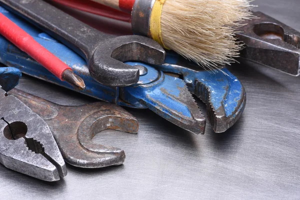 Tools and instruments on metal background — Stock Photo, Image