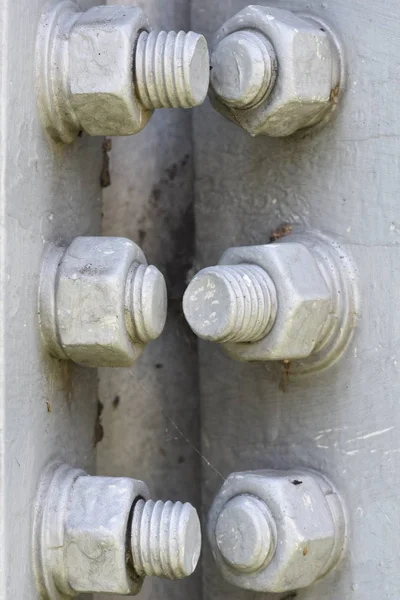 Bolts and nuts on metal construction — Stock Photo, Image