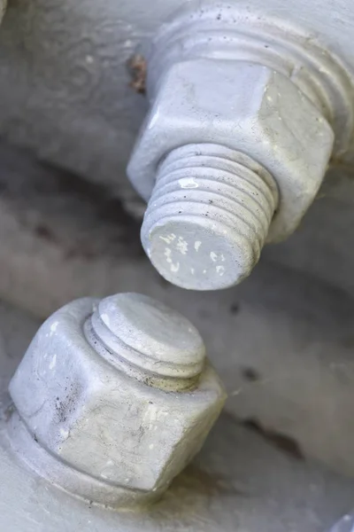 Bolts and nuts on metal construction — Stock Photo, Image