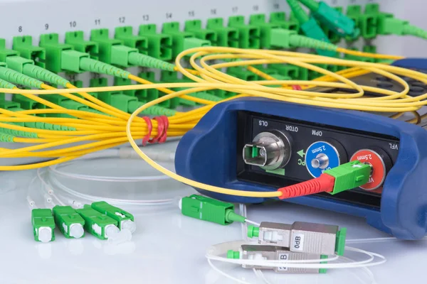 Optical Power Meter and Network of Fiber Patch Cord with Distribustion Frame Closeup
