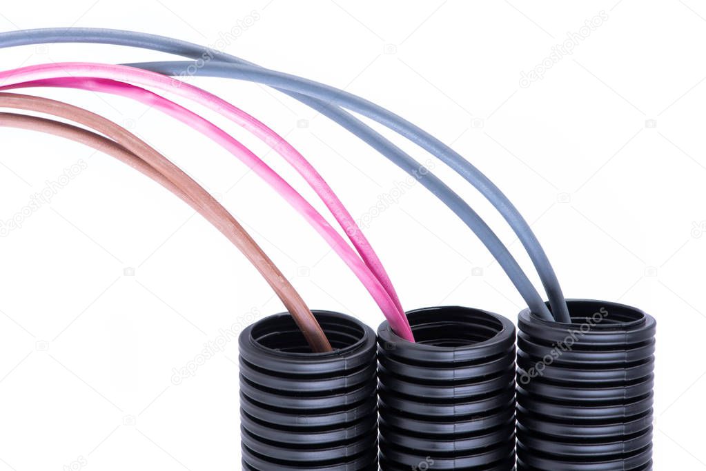 Corrugated Pipes with Electrical Installation Cables Isolated on White Background