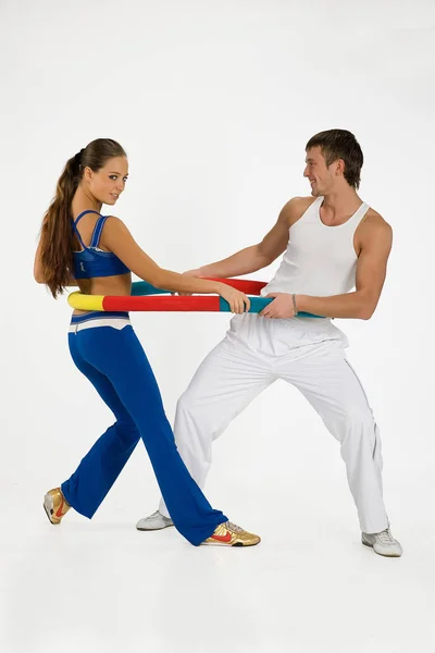 Young Woman And Man With Training Device — Stock Photo, Image