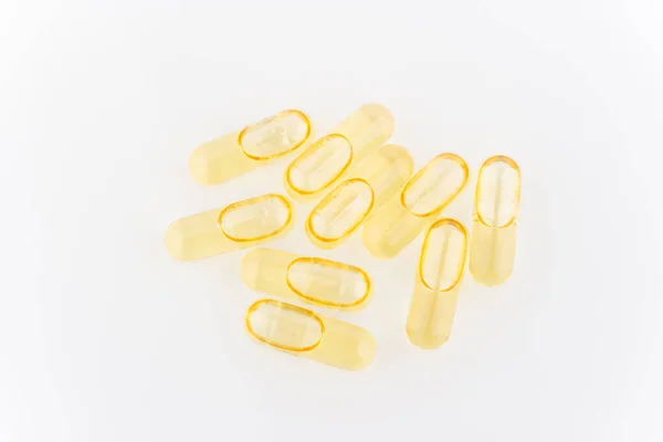 在浅层背景上关闭Omega 3胶囊 顶部视图 保健概念 — 图库照片