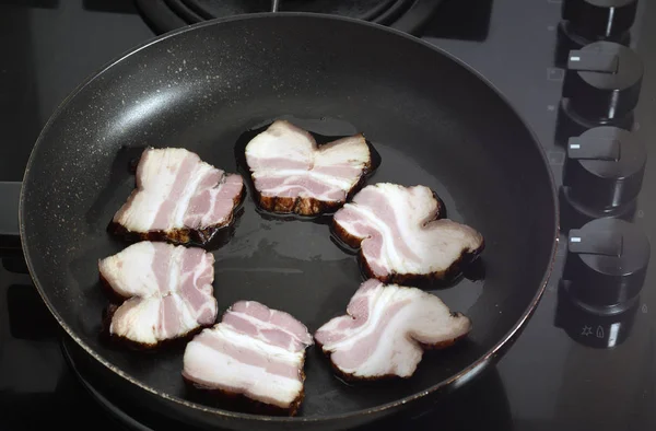 Ham in the frying pan — Stock Photo, Image