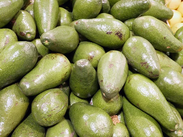 Counter med avocado grøntsager - Stock-foto