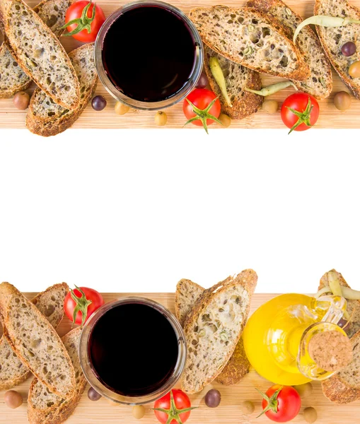 Baguette, olives, olive oil, vine, peppers and tomatoes, copy space. — Stock Photo, Image