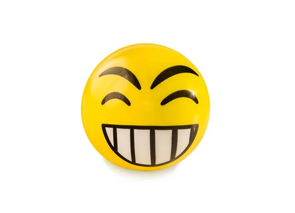 Laughing emoticon toy ball isolated over white. — Stock Photo, Image