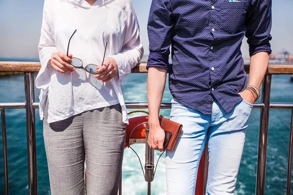 Happy couple in casual wear on the sea — Stock Photo, Image