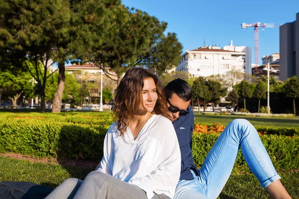 Couple resting at summer park — Stock Photo, Image