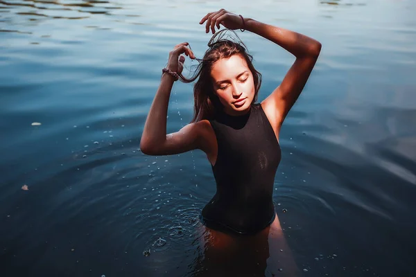 Woman in swimming suit on river — Stock Photo, Image