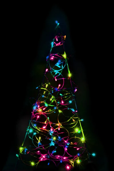 Árvore de natal formar a cor luzes xmas — Fotografia de Stock