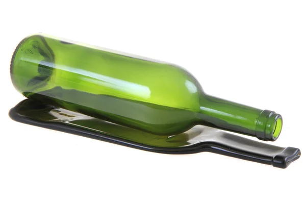 Garrafa de vidro verde com uma garrafa plana — Fotografia de Stock