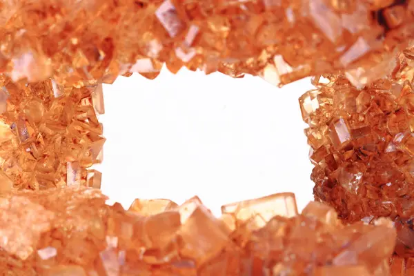 Bruine suiker kristallen achtergrond — Stockfoto