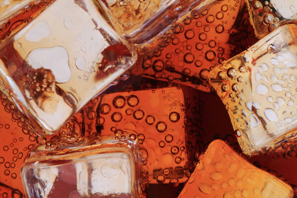 cola drink with ice cubes texture