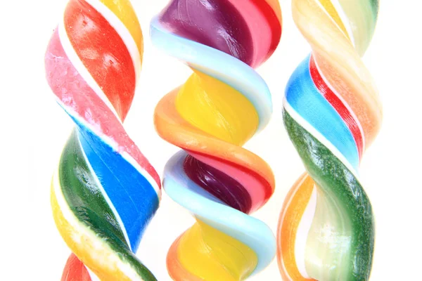 Rainbow cukru na patyku tekstury jako kolor tła — Zdjęcie stockowe