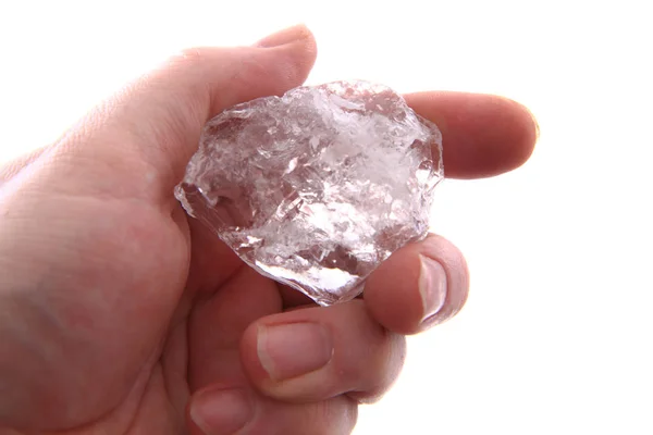 Crystal in the human hand — Stock Photo, Image