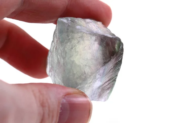 Fluorite in human hand — Stock Photo, Image