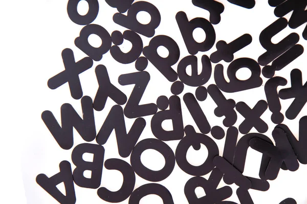 Izole siyah plastik alfabesi — Stok fotoğraf