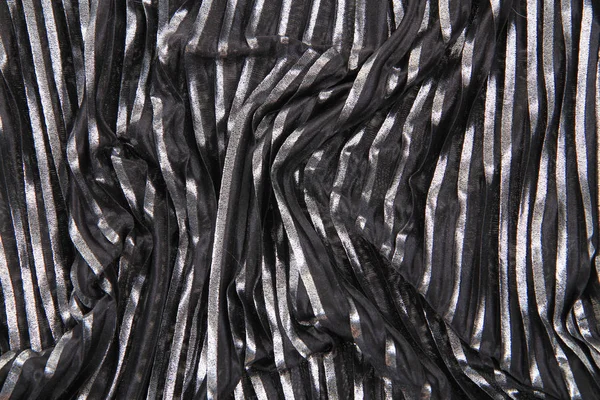 Textur aus schwarzem und silbernem Stoff — Stockfoto
