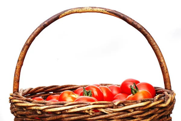 Fresh tomatoes in the basket — Stock Photo, Image