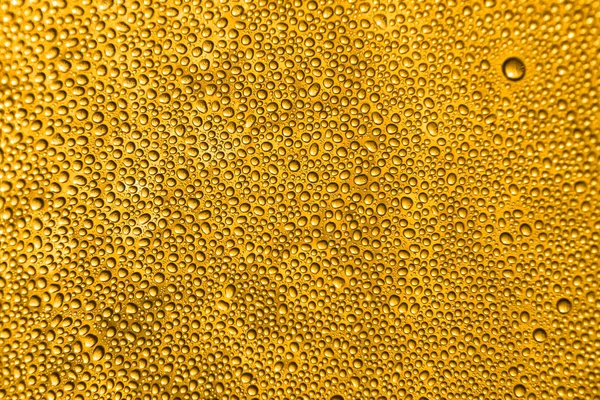 Gyllene öl textur — Stockfoto