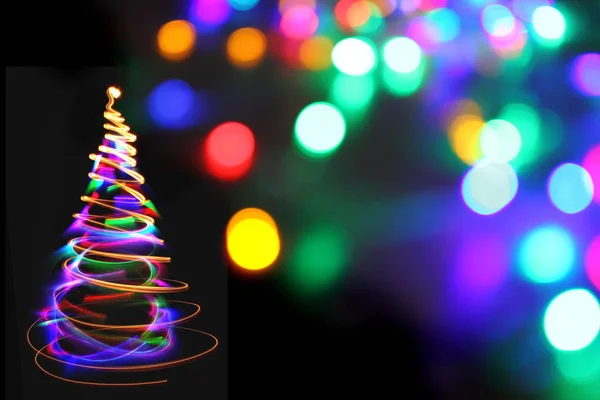Χριστουγεννιάτικο δέντρο από τις χρώμα φώτα — Φωτογραφία Αρχείου