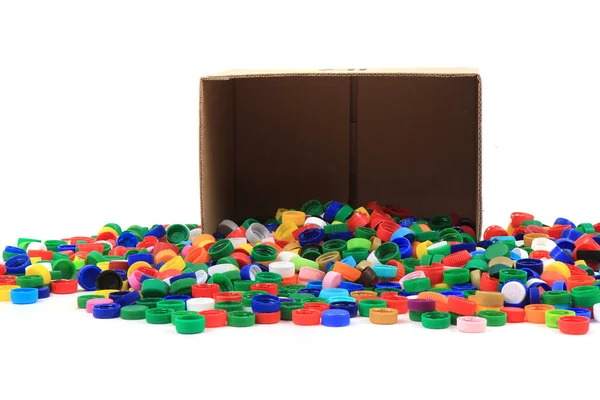 Color Plastic Caps Paper Box Isolated White Background — Stock Photo, Image