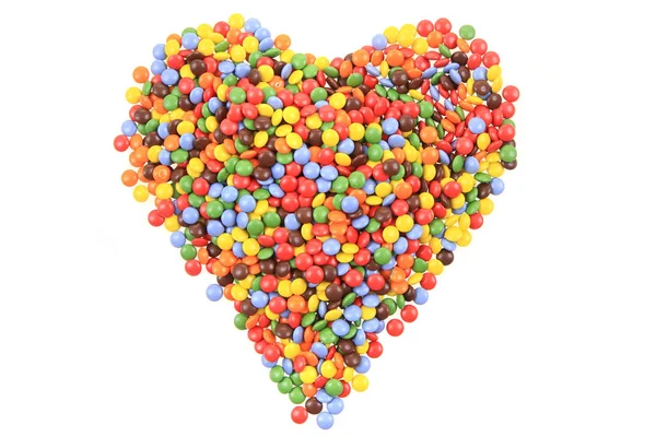 Cuore da smarties colore isolato — Foto Stock