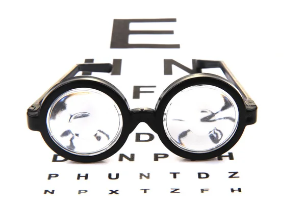 Brille Und Optiktest Isoliert Auf Weißem Hintergrund — Stockfoto
